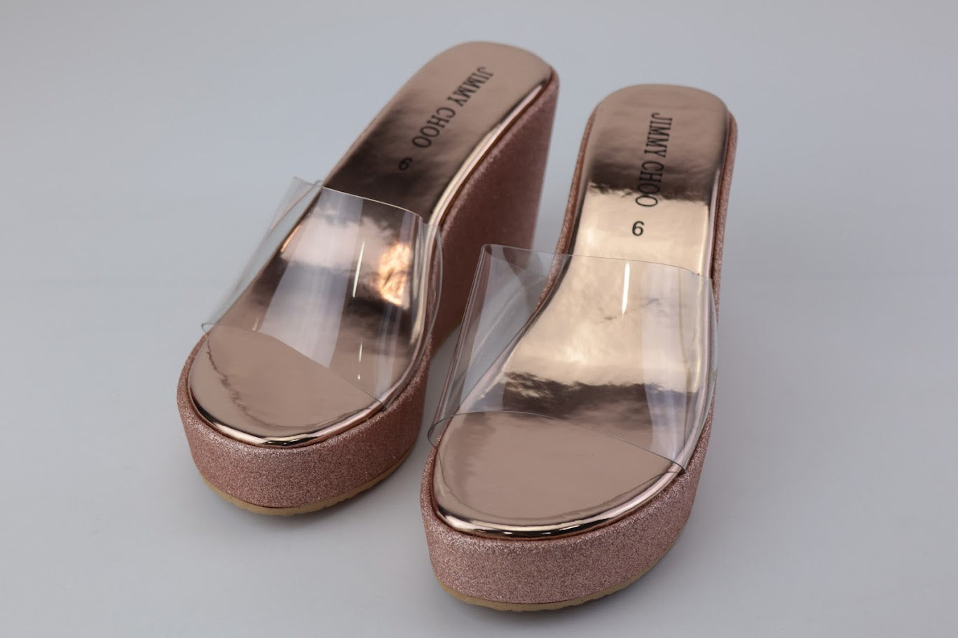 JIMMY CHOO Glittering Transparent Clear Wedge Sandals: A Pakistani Delight