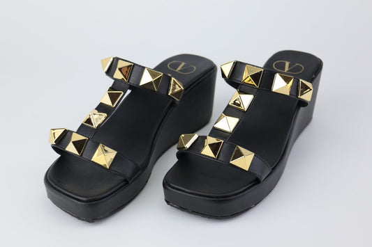 Golden Elegance: Embracing Comfort with Valentino's Roman Stud Wedge Sandals Pakistan